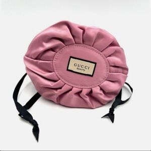 Gucci Pink Satin Beauty drawstring, makeup round Pouch. Brand new